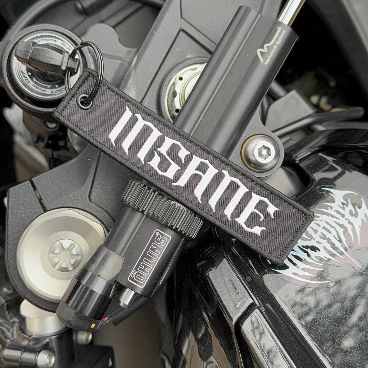 INSANE Embroidered Jet Tag